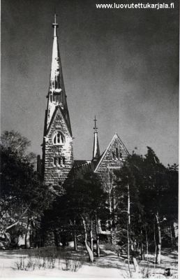 Koiviston kirkko, Leima kuvassa P J Björklund.
